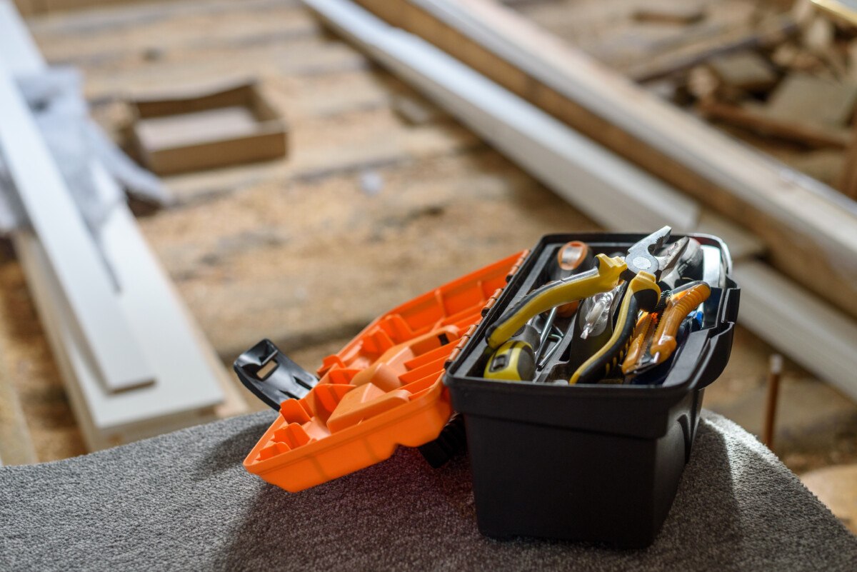 Tool box in apartment renovation area on floor